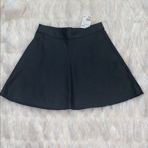 Divided H&M black faux leather skirt size 4